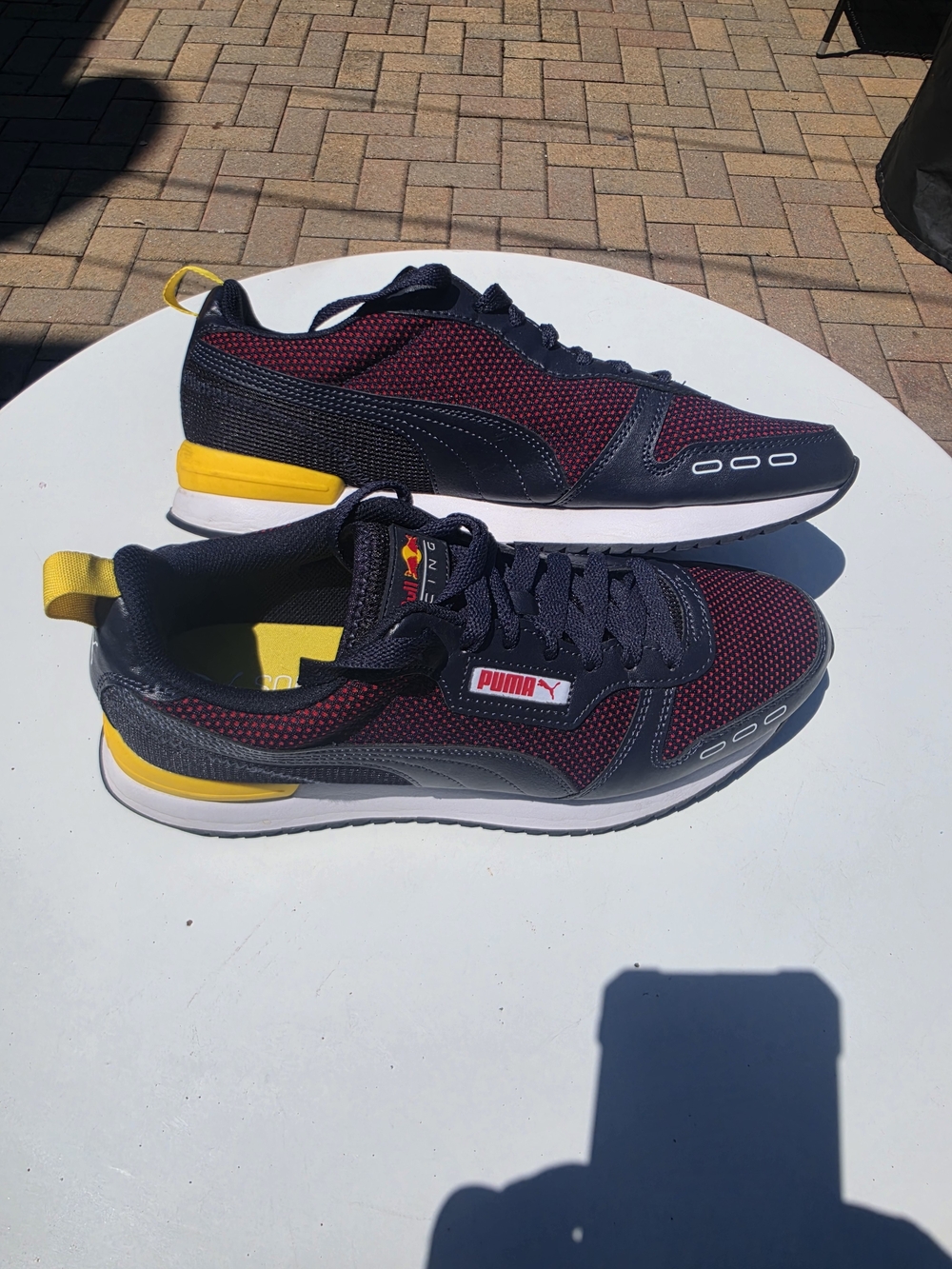 Puma Men’s Navy and Burgundy Sneakers with Yellow Accents